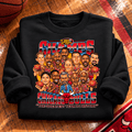 1996 Bulls Sweater in black folded with rolled sleeves on a basketball court