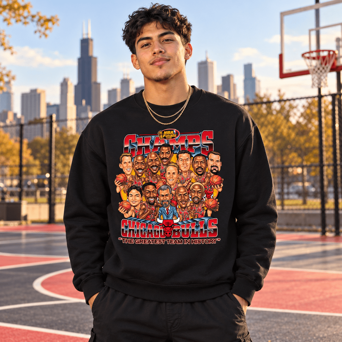 Male model wearing black 1996 Bulls Sweater with gold necklaces on a Chicago basketball court