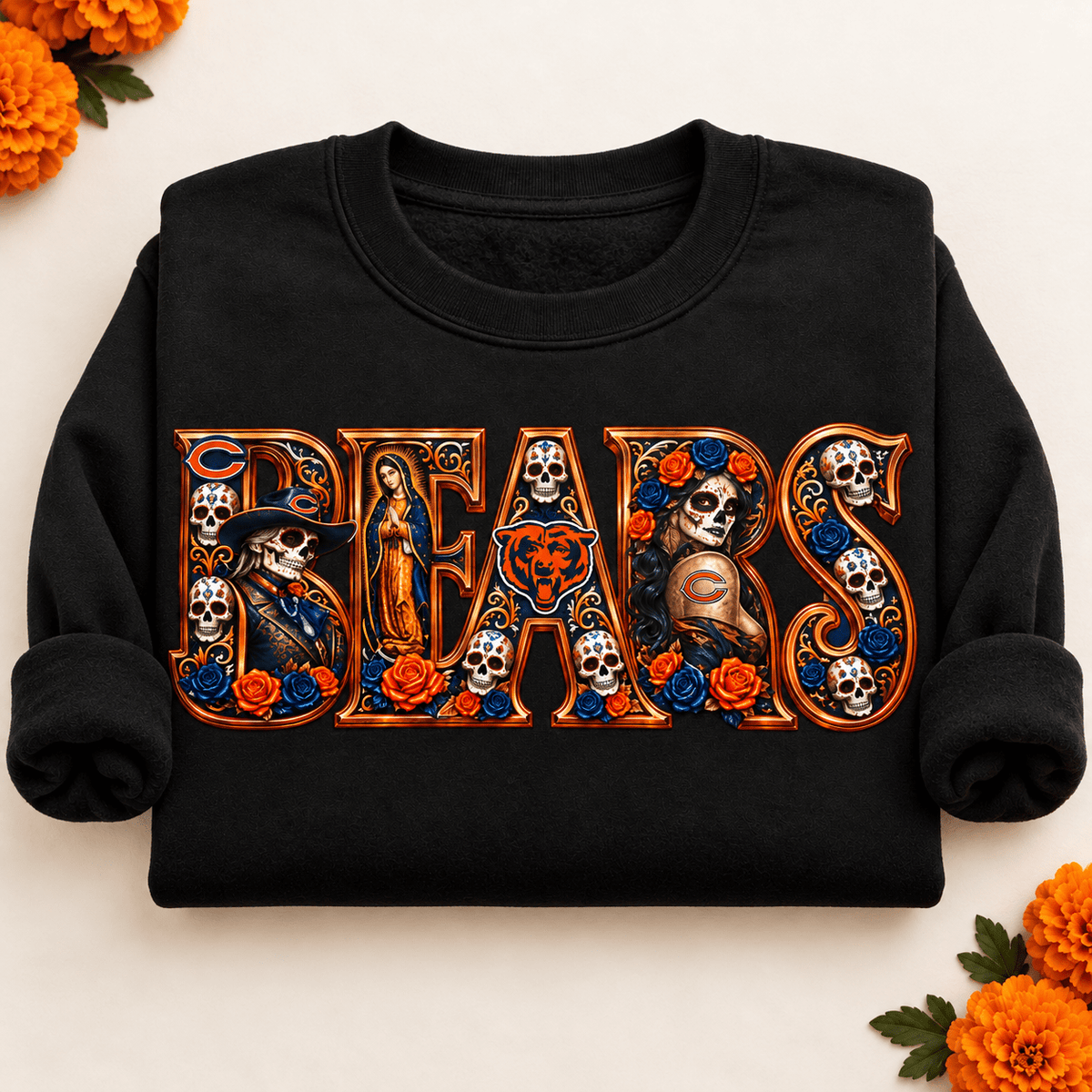 Folded black Chicago Bears Day of the Dead crewneck sweatshirt with rolled sleeves, sugar skull artwork and orange marigolds
