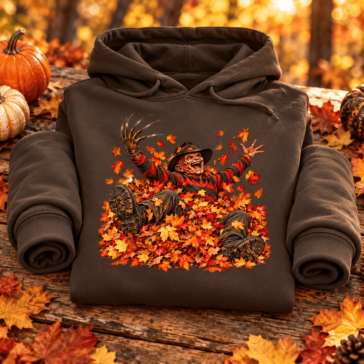 Freddy in Fall Halloween Hoodie — folded product with design-related background