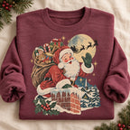 Santa’s Sleigh Sweater folded with rolled sleeves in Heather Dark Maroon