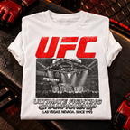 Vintage UFC T Shirt in White folded with rolled sleeves on an MMA arena backdrop